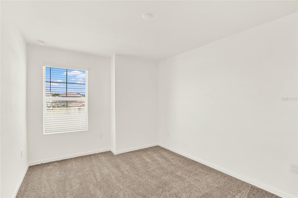 517 Bell Prairie Circle Lake Wales, FL 33859 - Photo 33 of 42 an empty room with windows