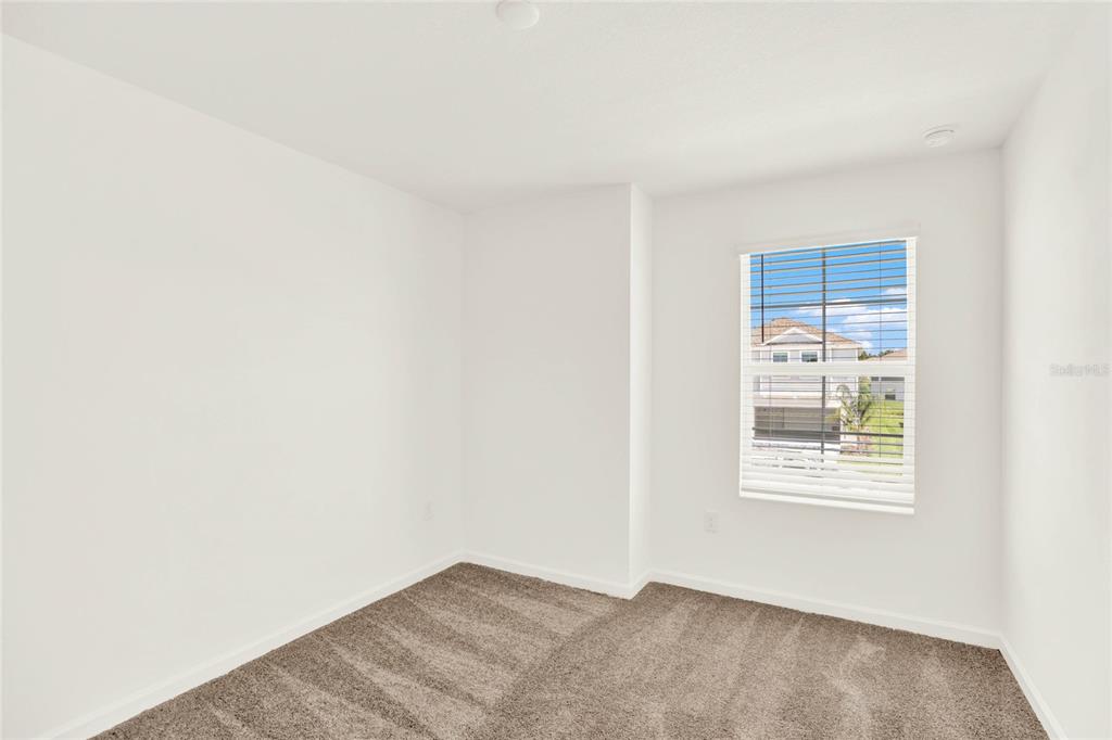 517 Bell Prairie Circle Lake Wales, FL 33859 - Photo 37 of 42 a view of an empty room with a window