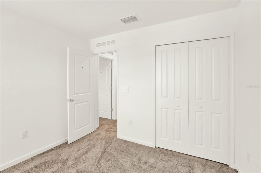 517 Bell Prairie Circle Lake Wales, FL 33859 - Photo 39 of 42 an empty room with closet area