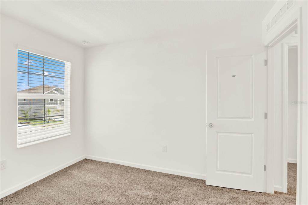 517 Bell Prairie Circle Lake Wales, FL 33859 - Photo 40 of 42 an empty room with windows