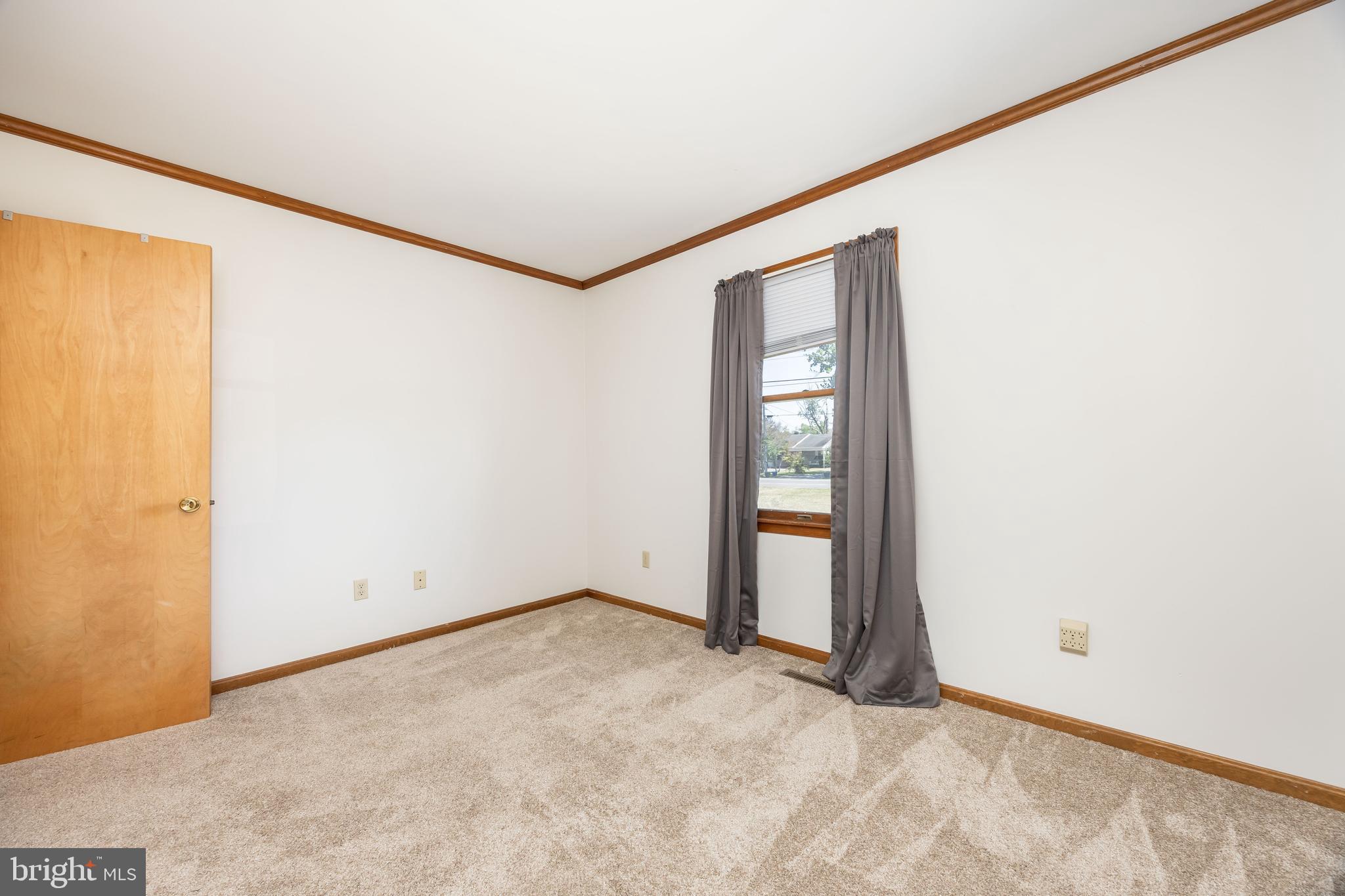 9830 Sharptown Road Mardela Springs, MD 21837 - Photo 29 of 51 an empty room with windows
