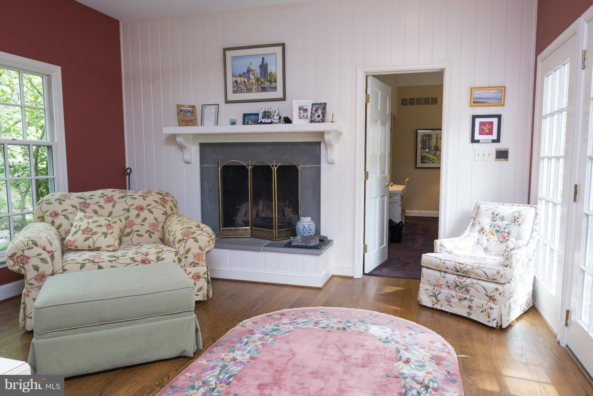 1908 Ruxton Road Baltimore, MD 21204 - Photo 12 of 29 a living room with furniture and a fireplace