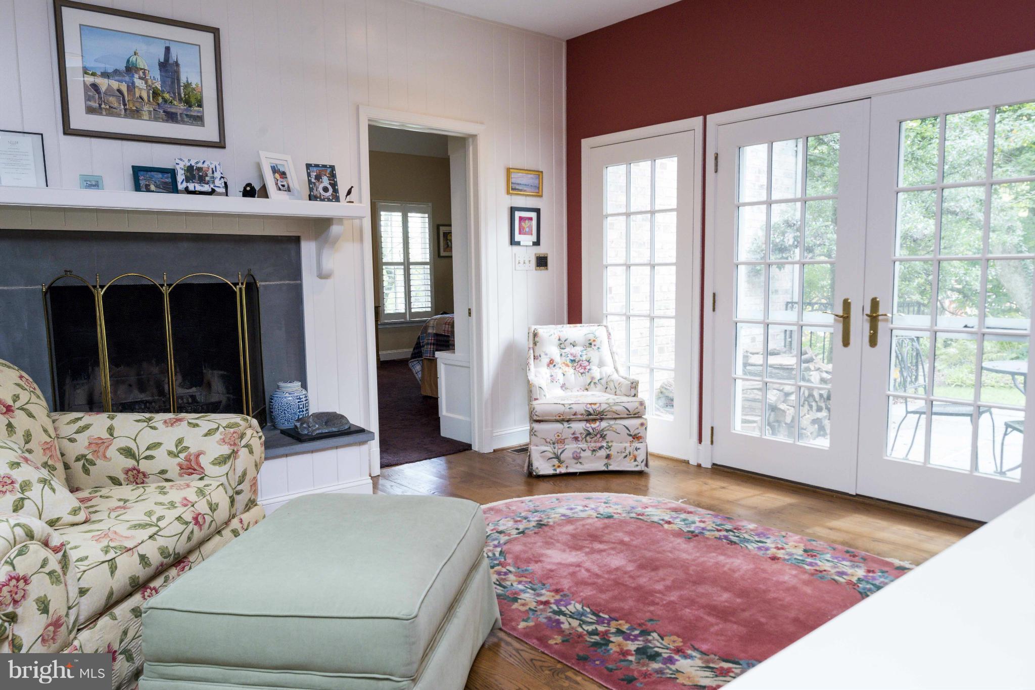 1908 Ruxton Road Baltimore, MD 21204 - Photo 13 of 29 a living room with furniture and a fireplace