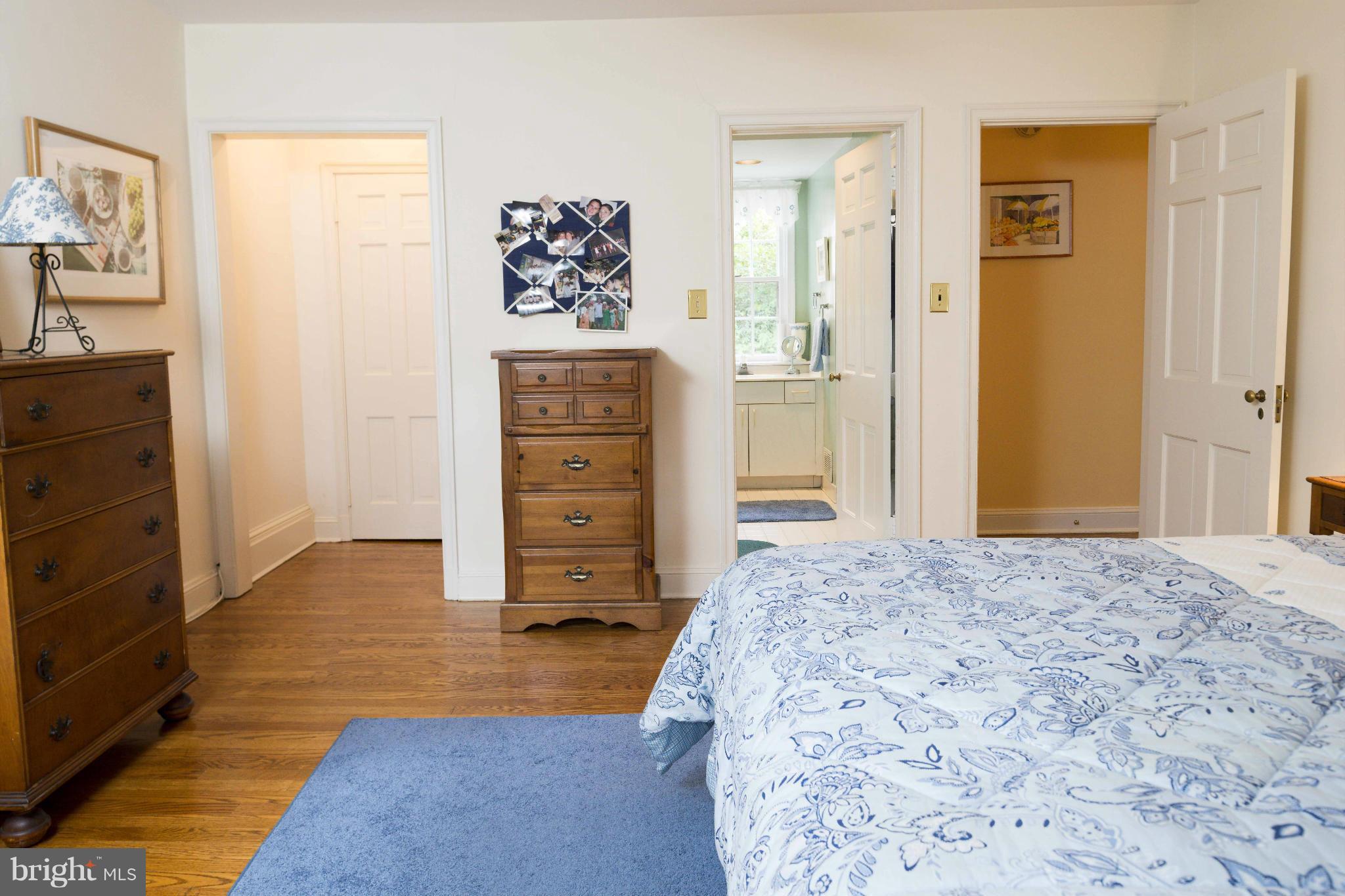 1908 Ruxton Road Baltimore, MD 21204 - Photo 20 of 29 a bed room with a bed and a mirror