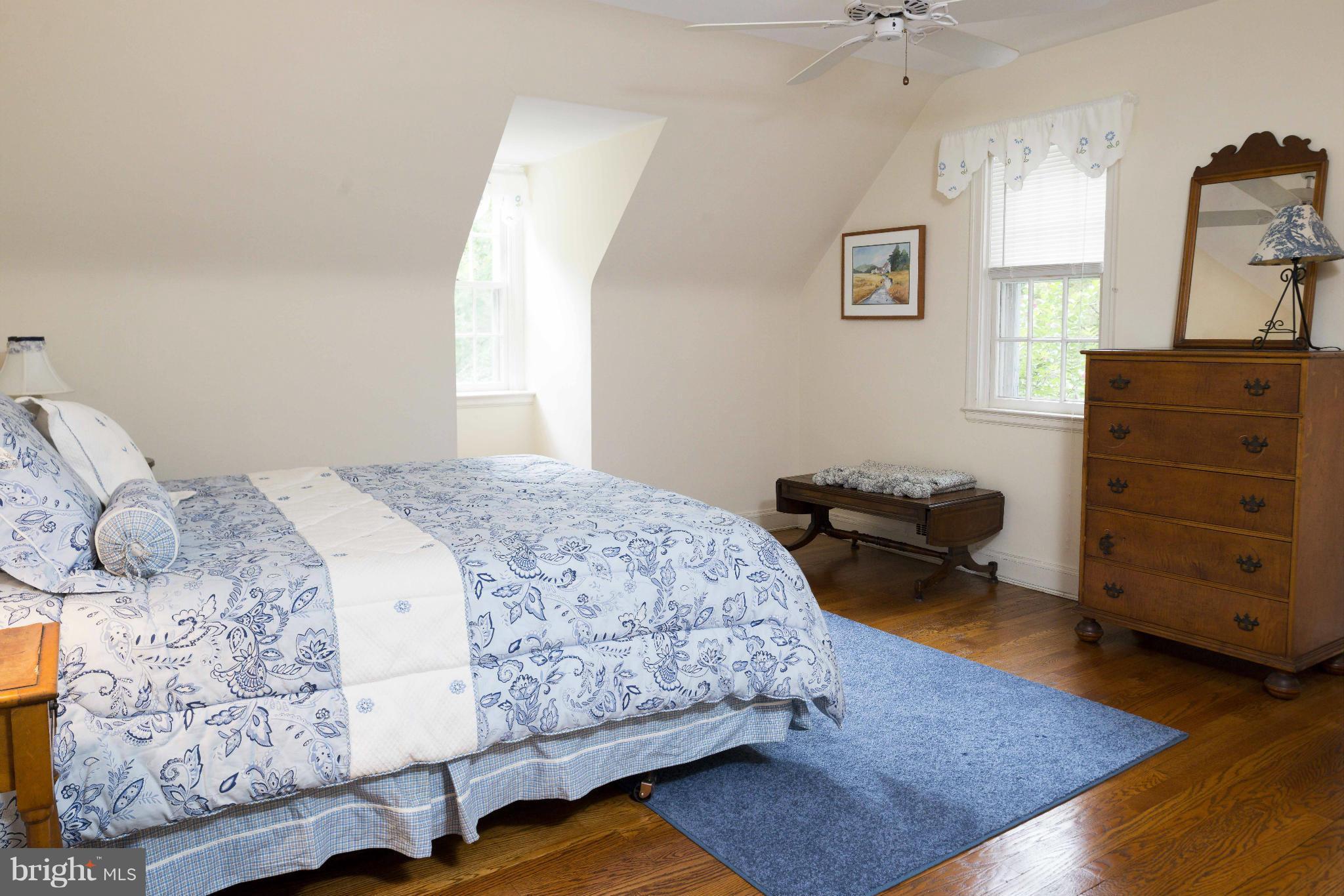 1908 Ruxton Road Baltimore, MD 21204 - Photo 21 of 29 a bedroom with a bed and furniture