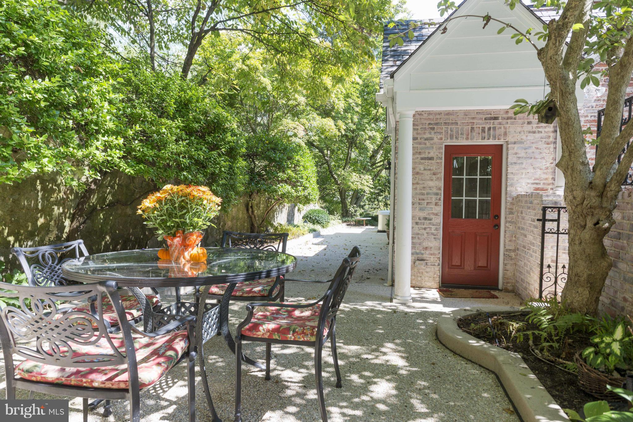 1908 Ruxton Road Baltimore, MD 21204 - Photo 23 of 29 a view of a patio with table and chairs and potted plants