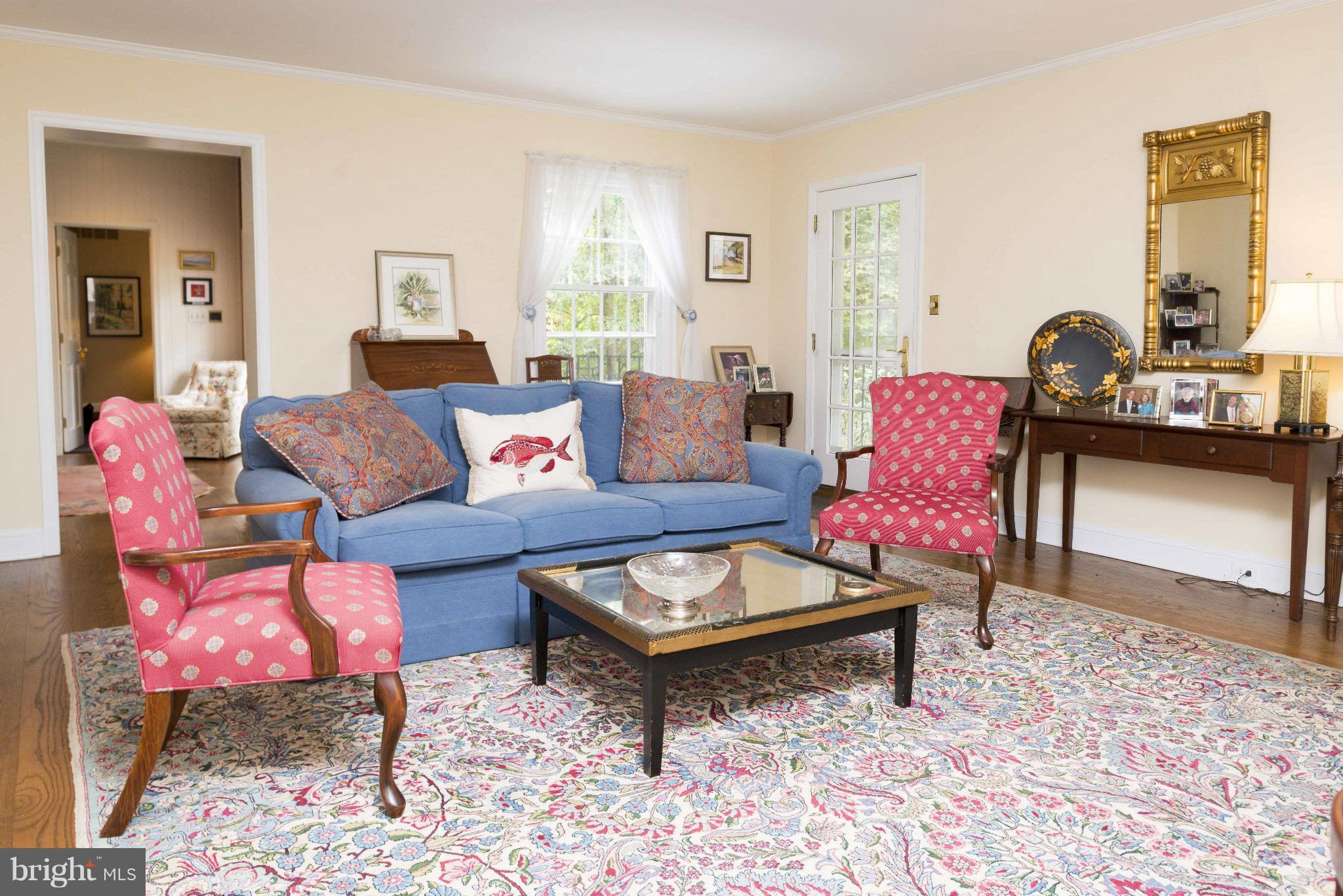 1908 Ruxton Road Baltimore, MD 21204 - Photo 4 of 29 a living room with furniture and wooden floor