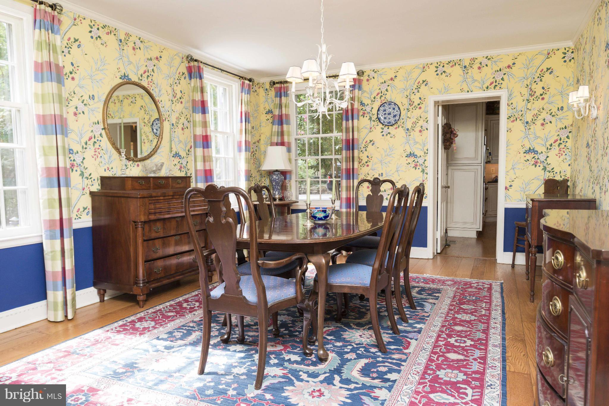 1908 Ruxton Road Baltimore, MD 21204 - Photo 5 of 29 a view of a dining room with furniture and wooden floor