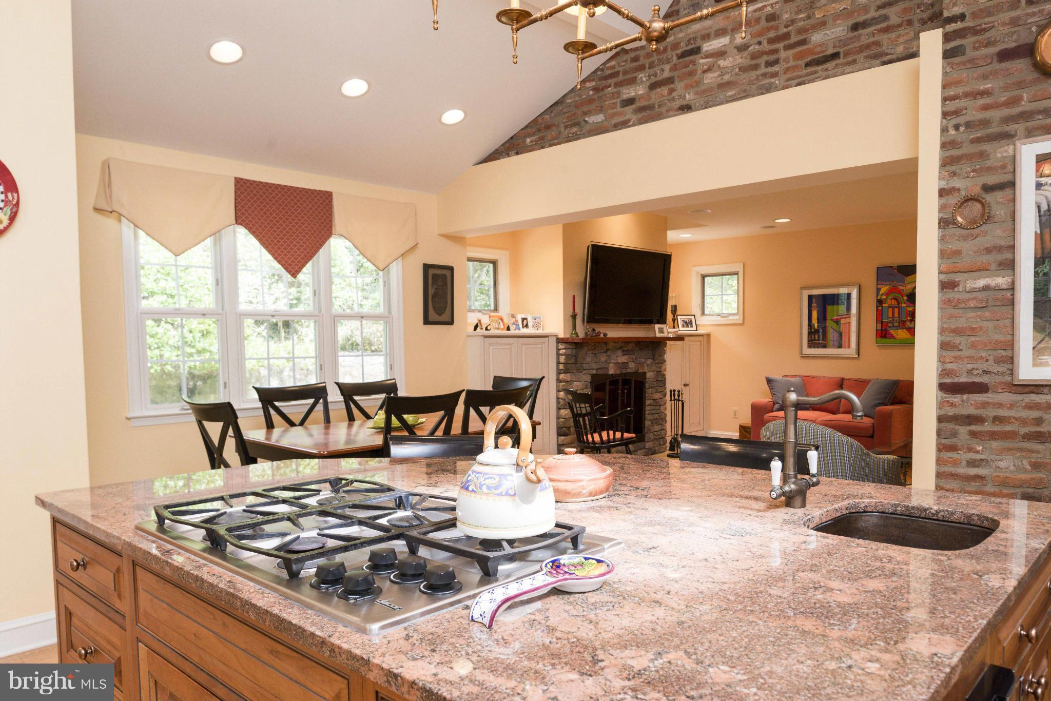 1908 Ruxton Road Baltimore, MD 21204 - Photo 7 of 29 a living room with fireplace furniture and a large window