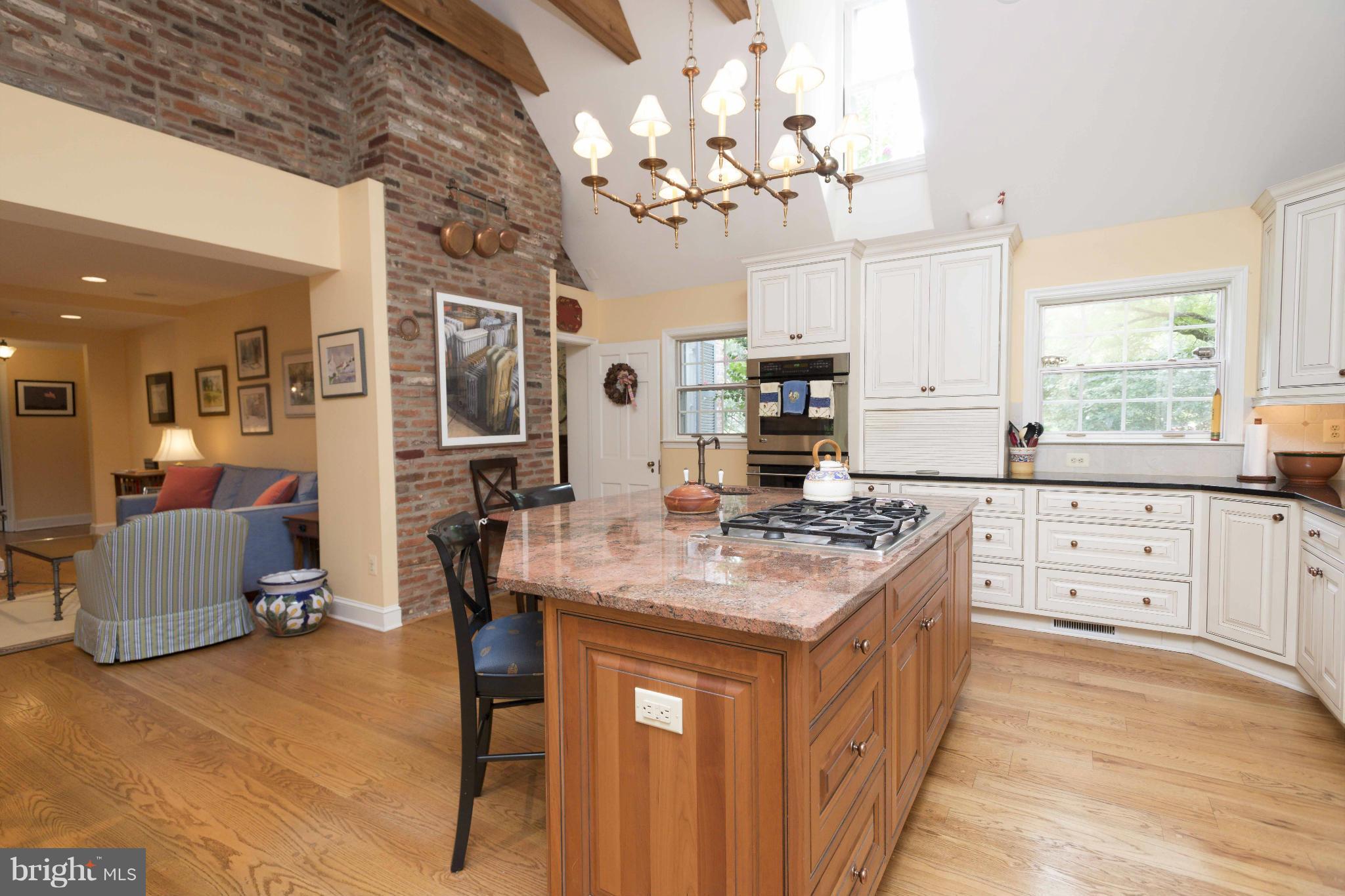 1908 Ruxton Road Baltimore, MD 21204 - Photo 8 of 29 a kitchen with stainless steel appliances granite countertop a sink stove and refrigerator
