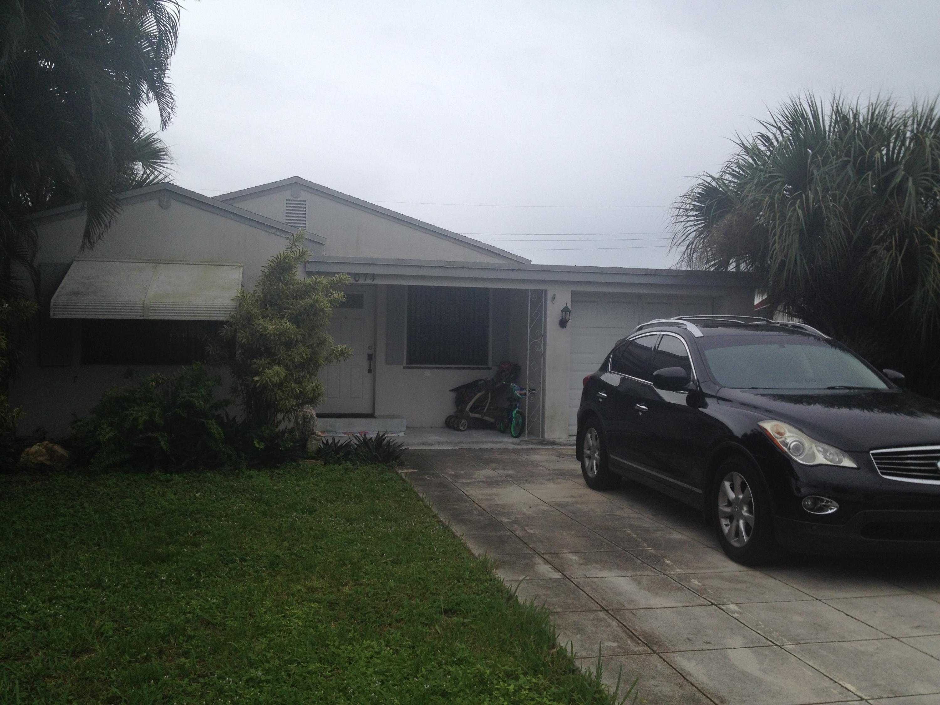 1074 James Road Lake Worth, FL 33462 - Photo 1 of 22 FRONT OF HOUSE