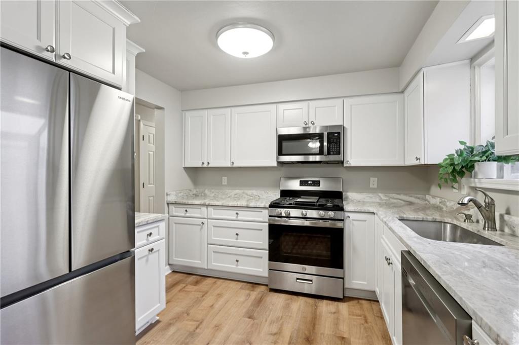 5374 Hardt Road Gibsonia, PA 15044 - Photo 13 of 49 a kitchen with a sink stove and refrigerator