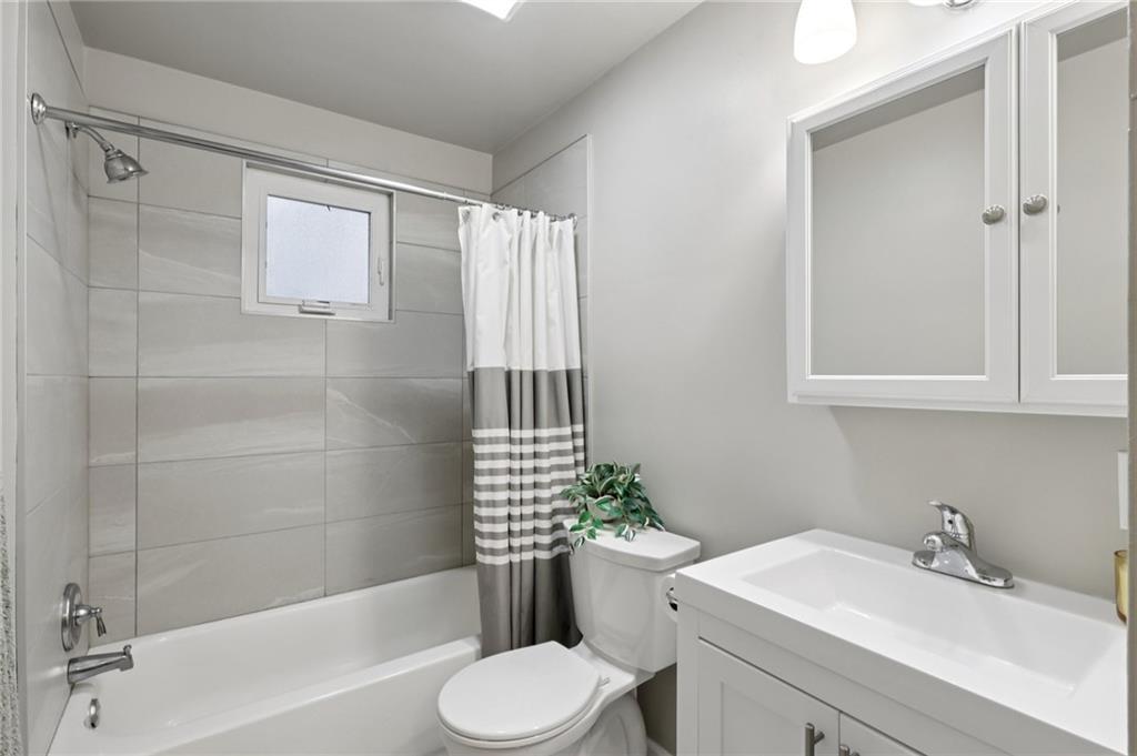 5374 Hardt Road Gibsonia, PA 15044 - Photo 18 of 49 a bathroom with a sink toilet and shower