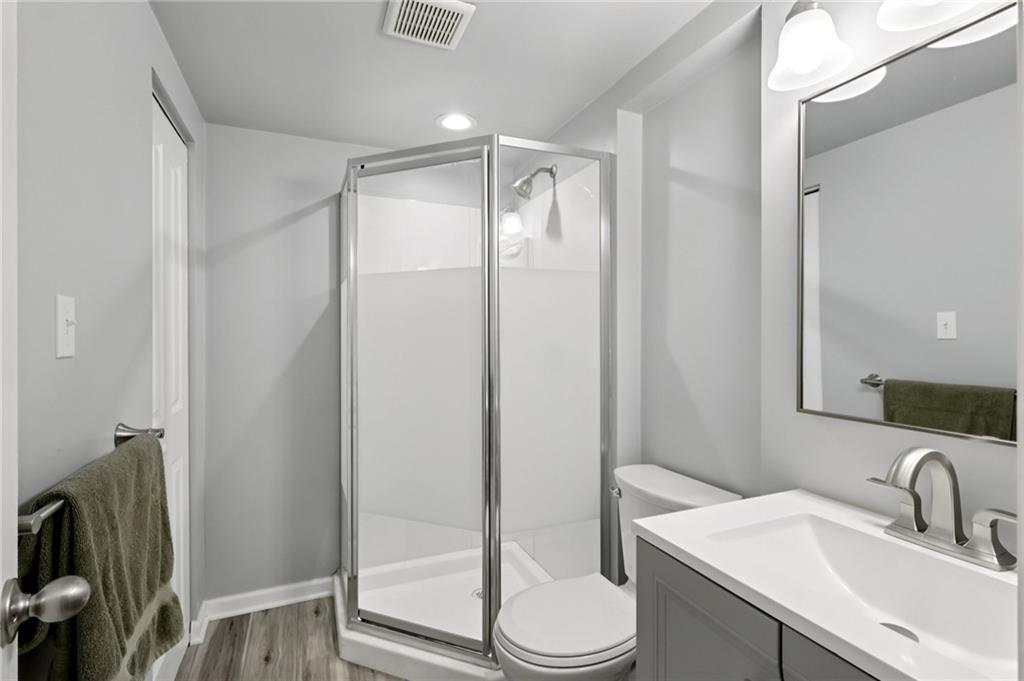 5374 Hardt Road Gibsonia, PA 15044 - Photo 27 of 49 a bathroom with a sink toilet and shower