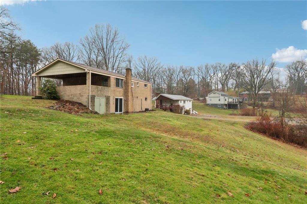 5374 Hardt Road Gibsonia, PA 15044 - Photo 38 of 49 a view of a house with backyard and trees