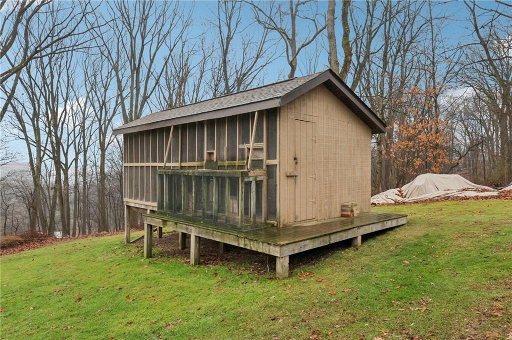 5374 Hardt Road Gibsonia, PA 15044 - Photo 40 of 49 a backyard of a house with table and chairs