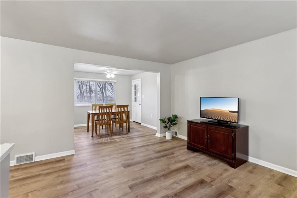 5374 Hardt Road Gibsonia, PA 15044 - Photo 6 of 49 a living room with furniture and a flat screen tv