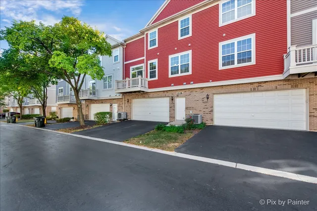 a city street lined with buildings and cars
