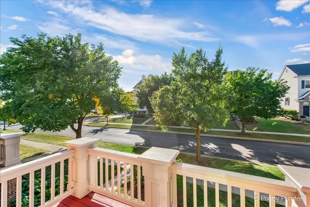 a kitchen with a stove sink and microwave