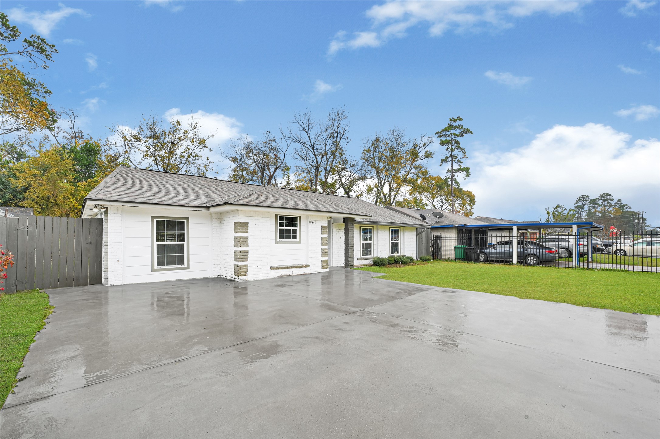 10842 Cheeves Drive Houston, TX 77016 - Photo 2 of 24 a view of a house next to a yard and road view