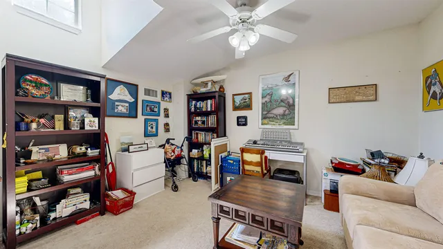 an aerial view of a house with outdoor space
