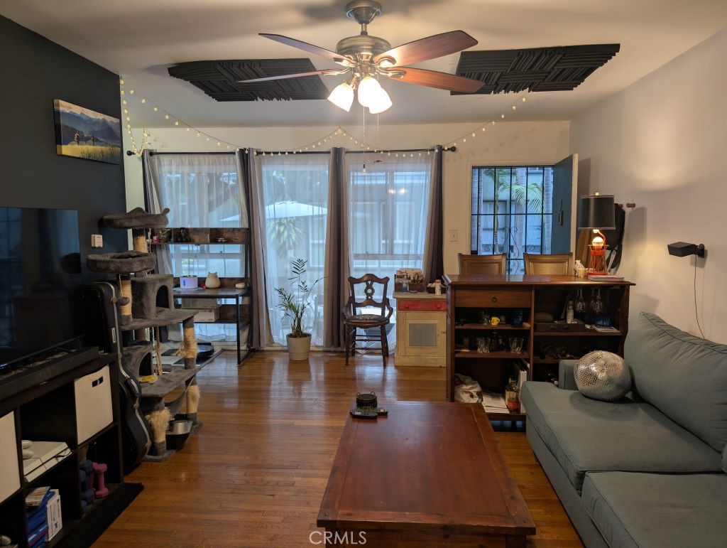 438 Cedar Avenue, Unit 4 Long Beach, CA 90802 - Photo 2 of 12 a living room with furniture and wooden floor