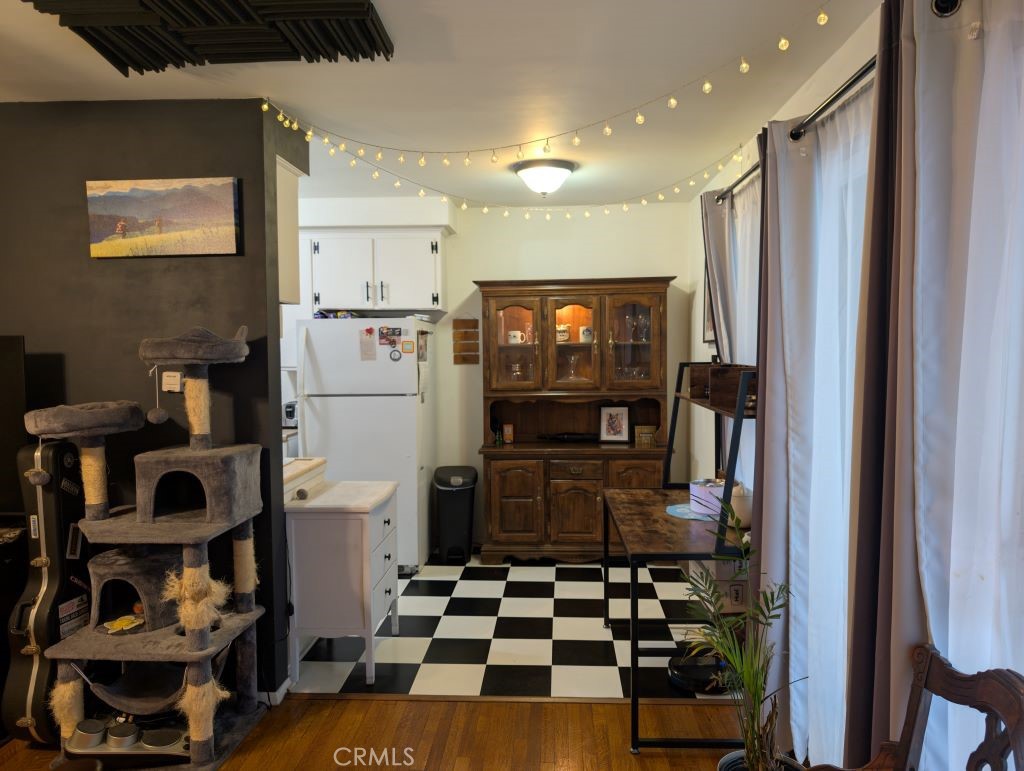 438 Cedar Avenue, Unit 4 Long Beach, CA 90802 - Photo 9 of 12 a kitchen with stainless steel appliances a refrigerator and a stove top oven