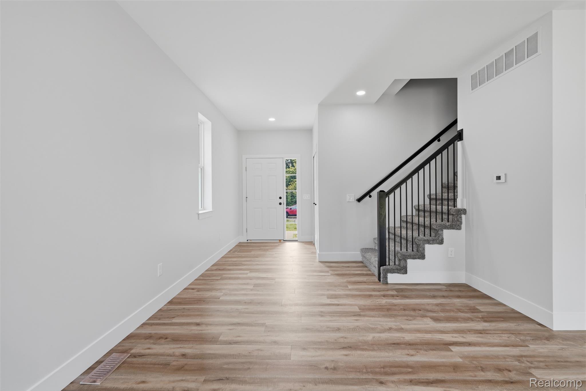 9400 Roland Brighton, MI 48116 - Photo 2 of 41 Bright entryway greets you.