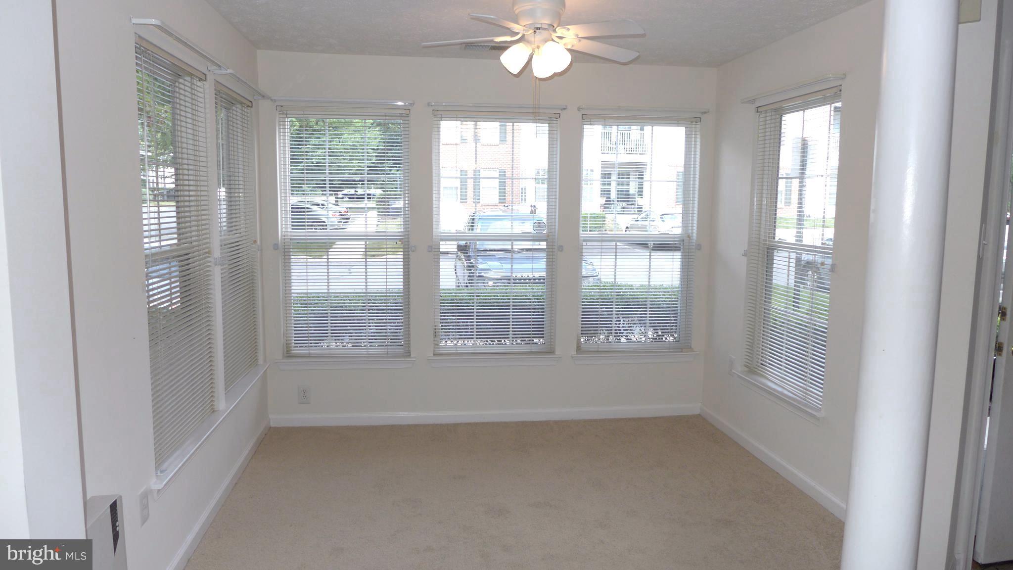 9746 Reese Farm Road, Unit 9746 Owings Mills, MD 21117 - Photo 9 of 22 a view of an empty room with a window