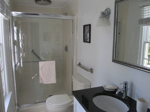 85 Brigantine Circle Norwell, MA 02061 - Photo 13 of 23 a bathroom with a granite countertop sink toilet and shower