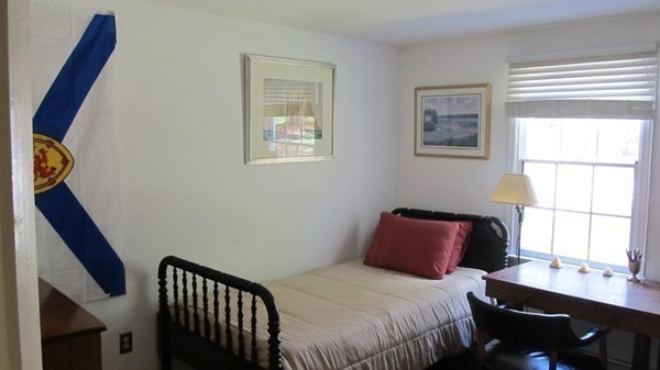 85 Brigantine Circle Norwell, MA 02061 - Photo 15 of 23 a bedroom with a bed and a window