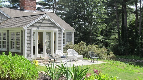 85 Brigantine Circle Norwell, MA 02061 - Photo 21 of 23 a front view of a house with a yard