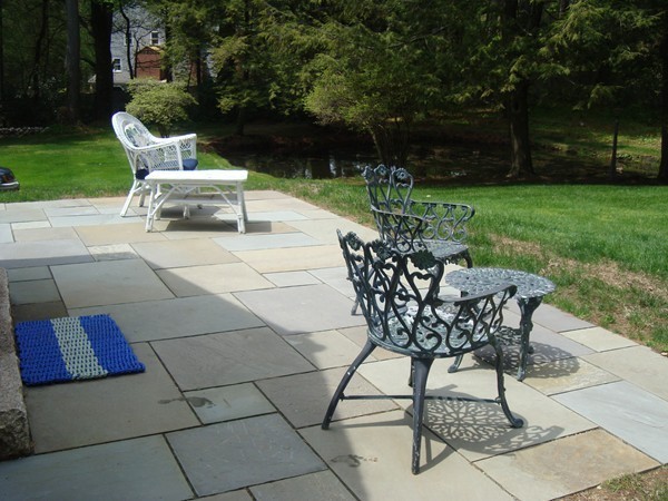 85 Brigantine Circle Norwell, MA 02061 - Photo 22 of 23 a view of a chairs and table in backyard of the house