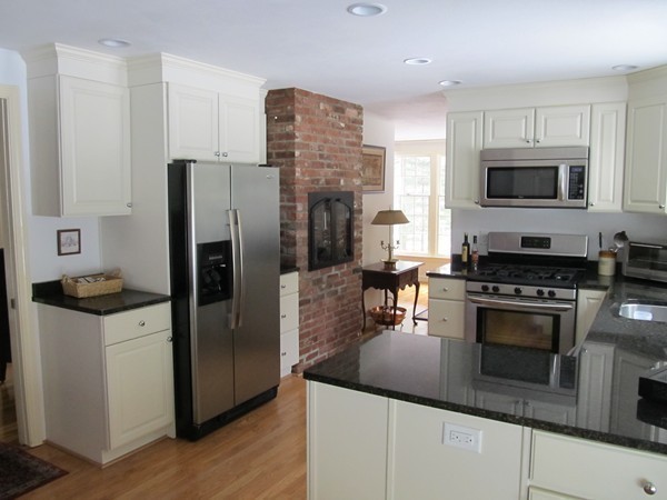 85 Brigantine Circle Norwell, MA 02061 - Photo 5 of 23 a kitchen with stainless steel appliances granite countertop a refrigerator stove and microwave