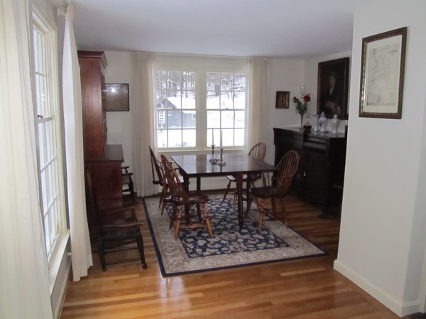 85 Brigantine Circle Norwell, MA 02061 - Photo 6 of 23 a view of a dining room with furniture and wooden floor