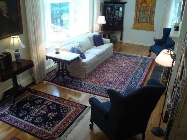 85 Brigantine Circle Norwell, MA 02061 - Photo 7 of 23 a living room with a couch a rug and a fireplace