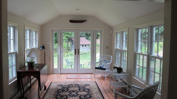 85 Brigantine Circle Norwell, MA 02061 - Photo 9 of 23 a living room with furniture and a large window