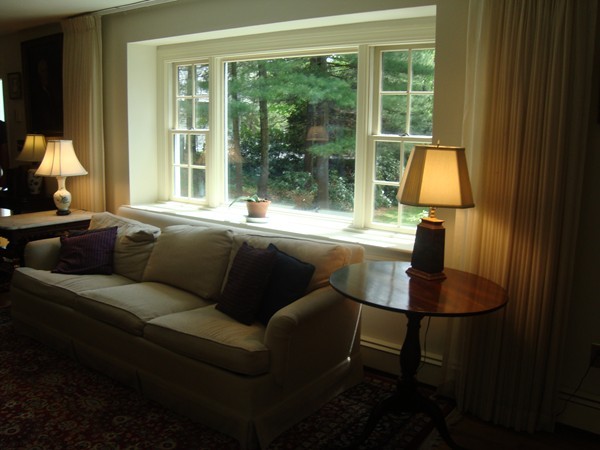 85 Brigantine Circle Norwell, MA 02061 - Photo 10 of 23 a living room with a couch and a table