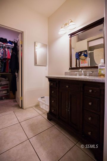 1516 South Farragut Street Ridgecrest, CA 93555 - Photo 20 of 24 a kitchen with a sink and cabinets