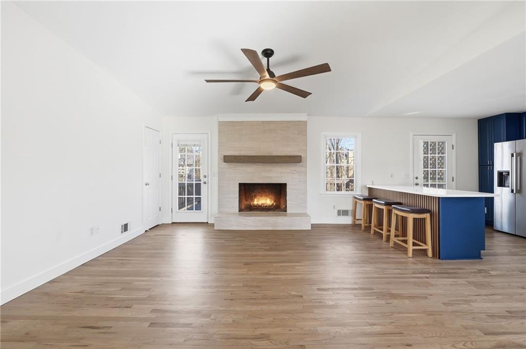 2810 Shaw Road Marietta, GA 30066 - Photo 14 of 38 a living room with furniture and a fireplace