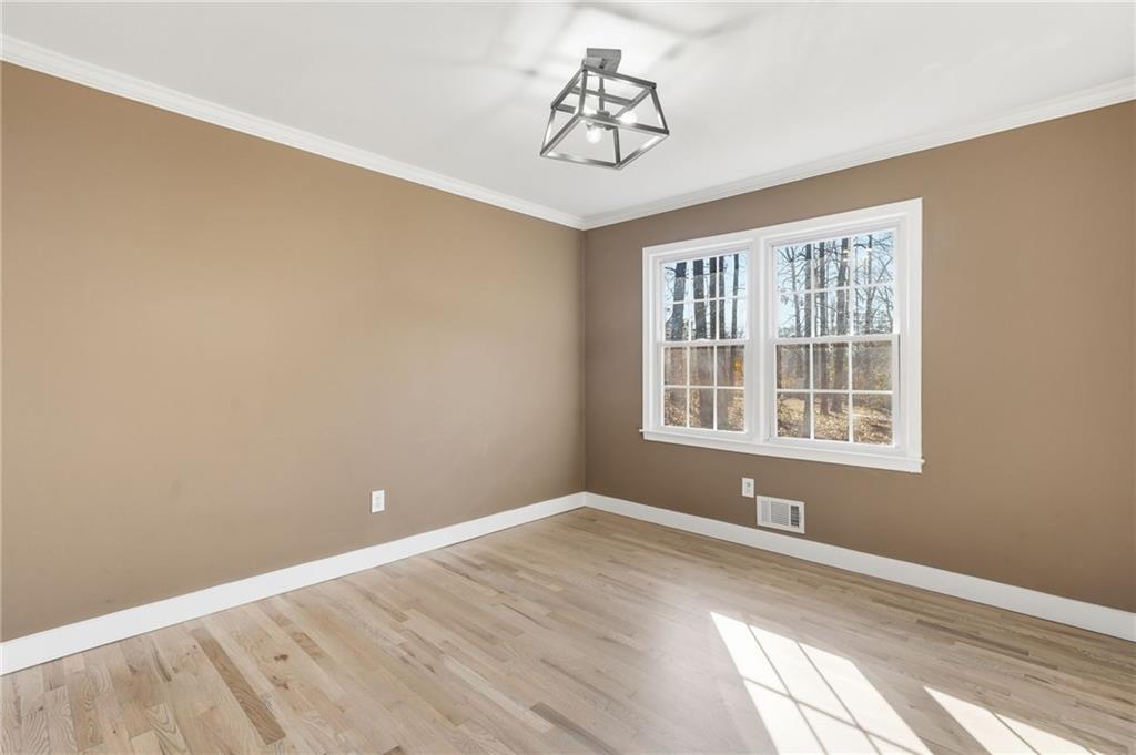 2810 Shaw Road Marietta, GA 30066 - Photo 7 of 38 a view of wooden floor and windows in a room
