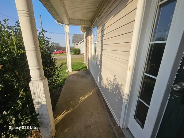 a front view of house with garden