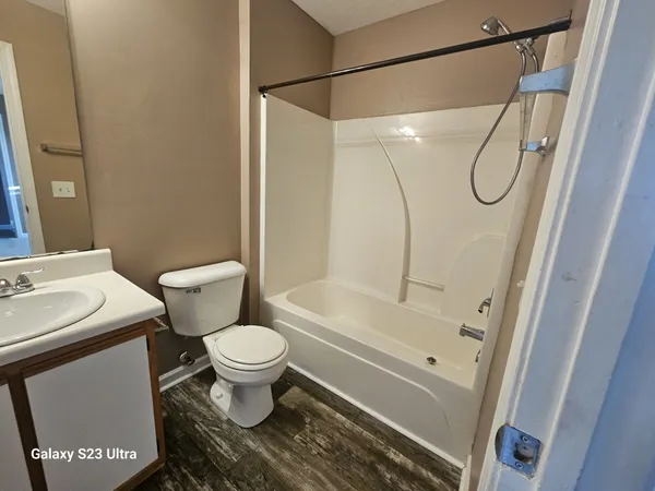 an empty room with a empty space and a window