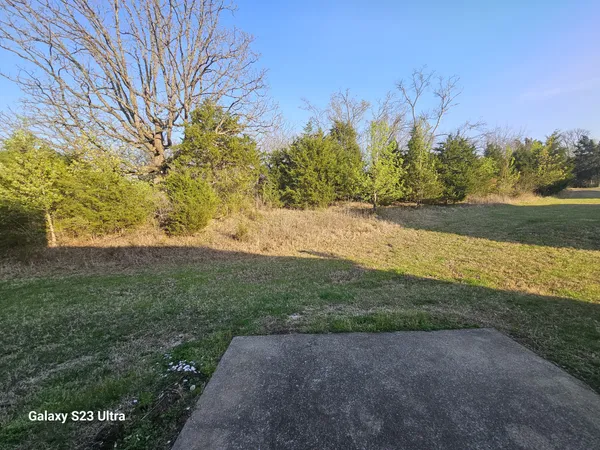 a view of a porch with seating space