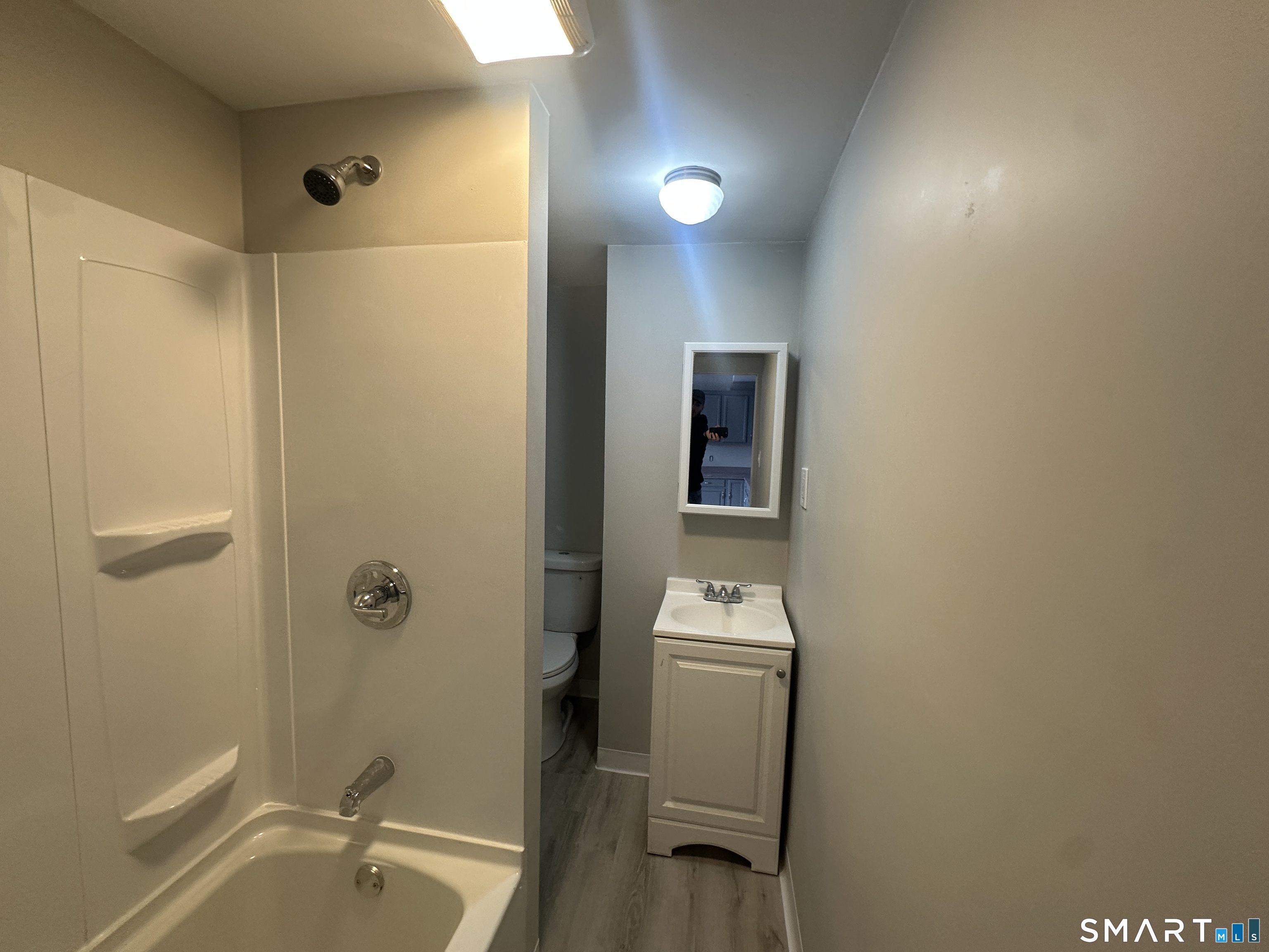 86 Gold Street, Unit 2S New Britain, CT 06053 - Photo 6 of 9 a bathroom with a toilet and a shower