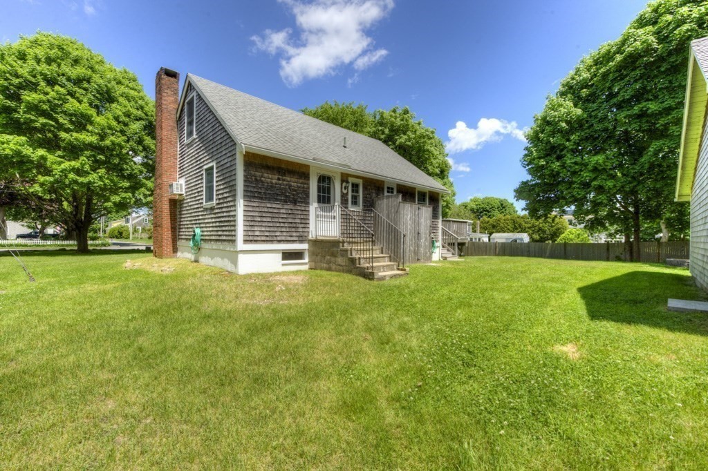 1 Factory Street Sandwich, MA 02563 - Photo 20 of 38 a front view of house with a garden