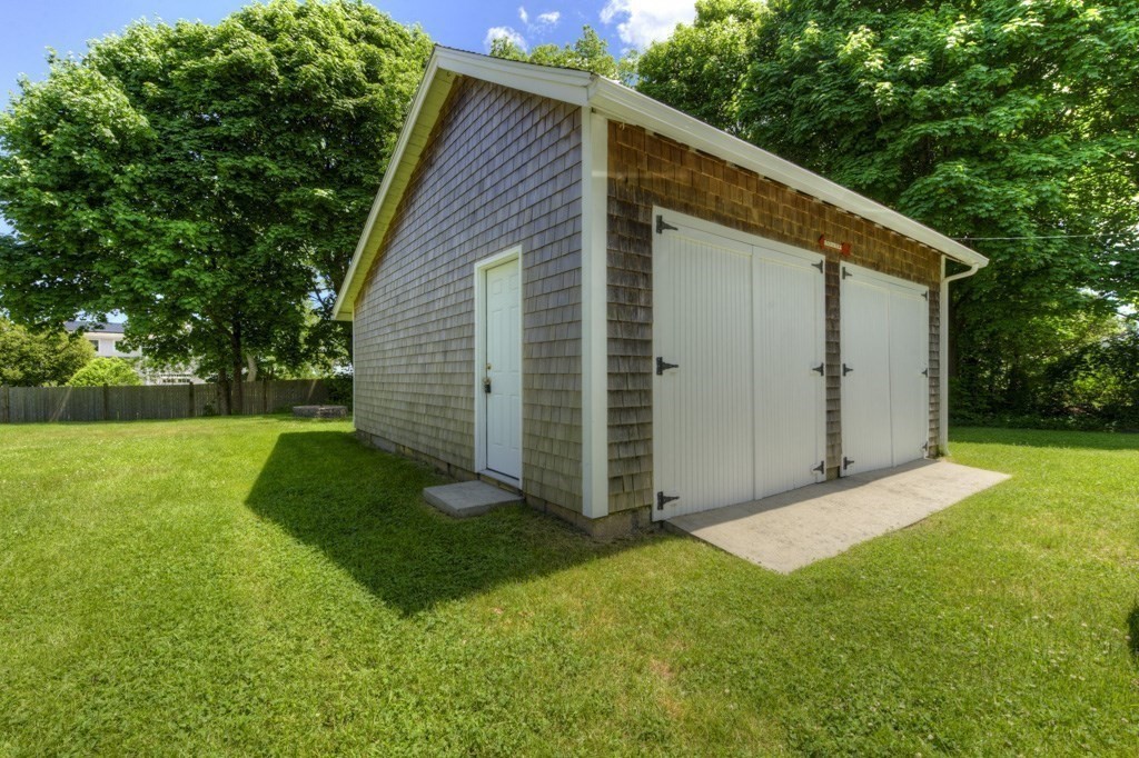 1 Factory Street Sandwich, MA 02563 - Photo 21 of 38 a view of backyard with potted plants and large tree