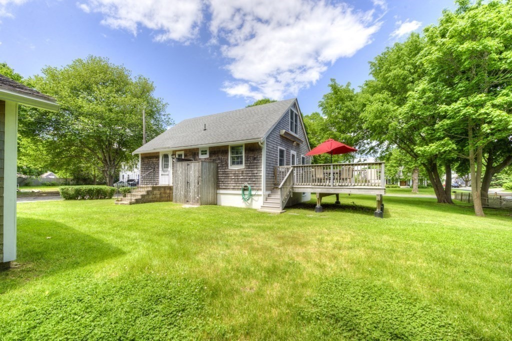 1 Factory Street Sandwich, MA 02563 - Photo 26 of 38 a view of a house with a yard porch and sitting area