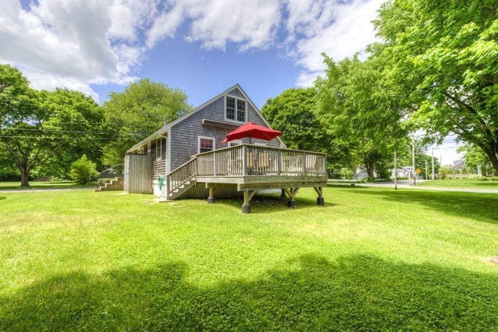 1 Factory Street Sandwich, MA 02563 - Photo 27 of 38 a view of a house with a yard porch and sitting area