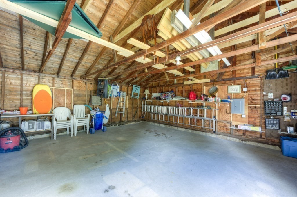 1 Factory Street Sandwich, MA 02563 - Photo 32 of 38 a view of a porch with a table and chairs